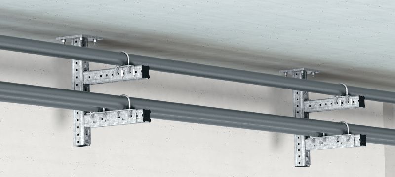 Conector MIC-UB Conector galvanizado en caliente (HDG) para la fijación de pernos en U a vigas MI con gran capacidad de ajuste Aplicaciones 1